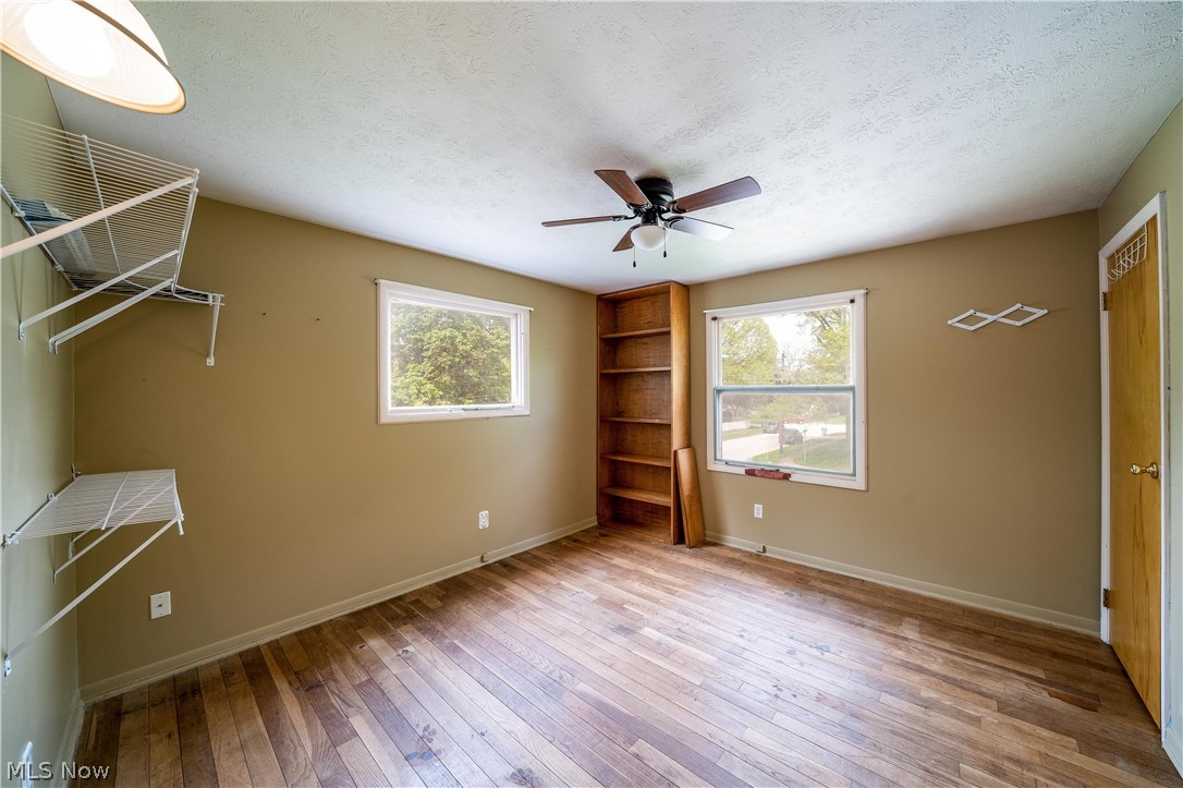 3754 Vira Road Stow, OH 44224 - Photo 28 of 35 3754 Vira Rd, Stow, OH 44224 won't last long! 4 Bedrooms & full bath on the 2nd floor as well as half bath on the 1st floor, separate Living Room, Family Room with beautiful Fireplace, gorgeous Sunroom with sliding doors to the huge deck with fenced rear yard & tool shed, Kitchen & Dining Room with wood floors; Full basement with half finished for recreation Room & other half as workshop & Hobby area as well as Laundry Hookups & Utilities.