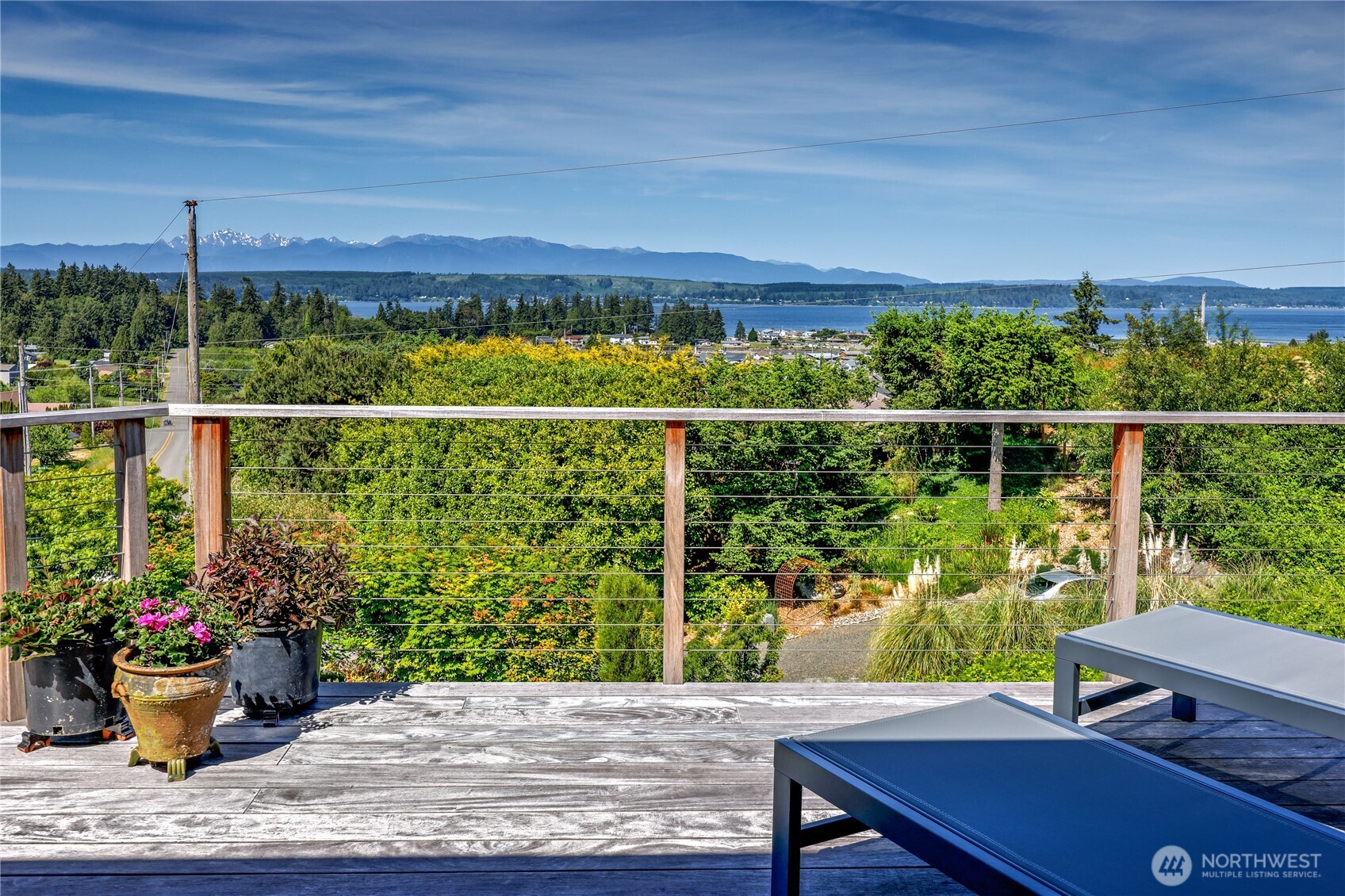 37709 Olympic View Road Northeast Hansville, WA 98340 - Photo 39 of 40 a view of a ocean from a balcony
