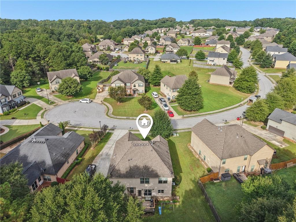115 Tanners Court Covington, GA 30016 - Photo 15 of 60 an aerial view of a house with yard swimming pool and mountains