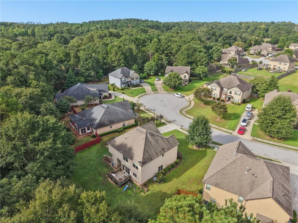 115 Tanners Court Covington, GA 30016 - Photo 17 of 60 an aerial view of a house with a garden