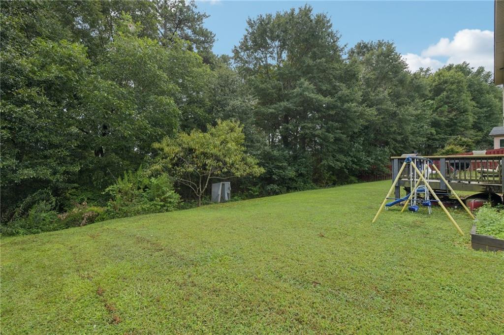 115 Tanners Court Covington, GA 30016 - Photo 24 of 60 a view of an outdoor space and entertaining space