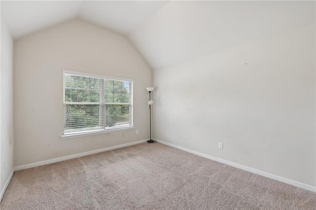 115 Tanners Court Covington, GA 30016 - Photo 32 of 60 an empty room with a window