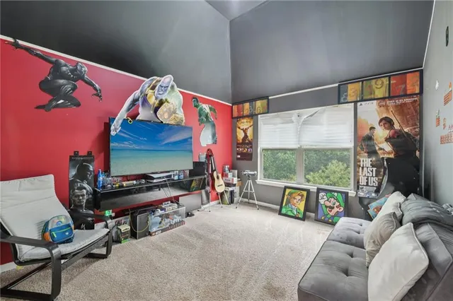 a kitchen with stainless steel appliances granite countertop sink stove top oven and refrigerator