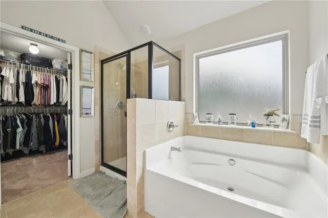 a view of a dining room with furniture wooden floor and chandelier