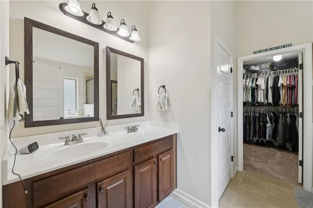 a kitchen with a table and chairs in it