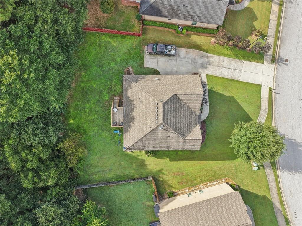 115 Tanners Court Covington, GA 30016 - Photo 5 of 60 an aerial view of a house with a yard