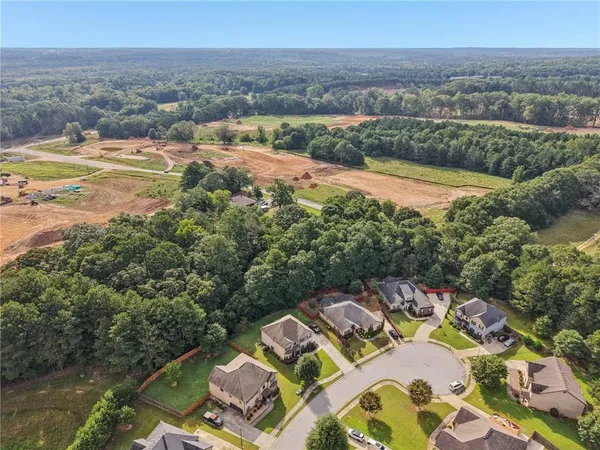 an aerial view of a house with a garden