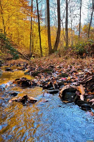 a view of a house with basketball court