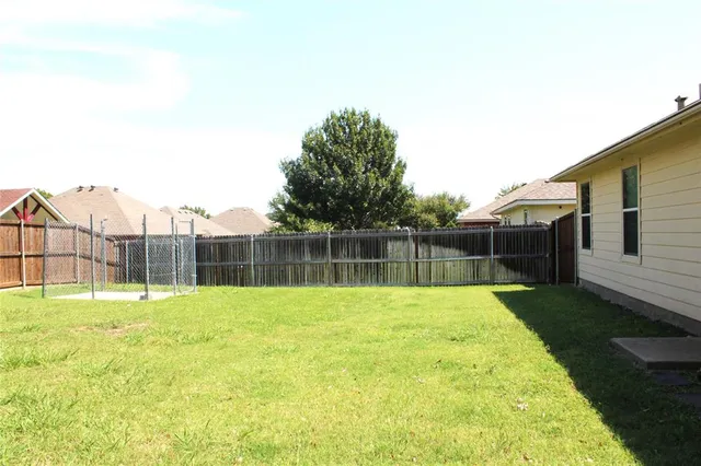 a swimming pool with a yard