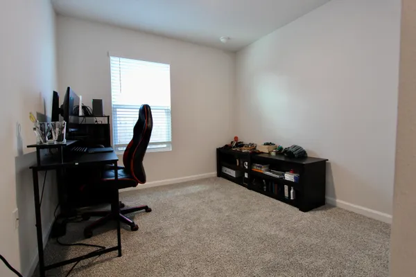 a room with furniture and a window