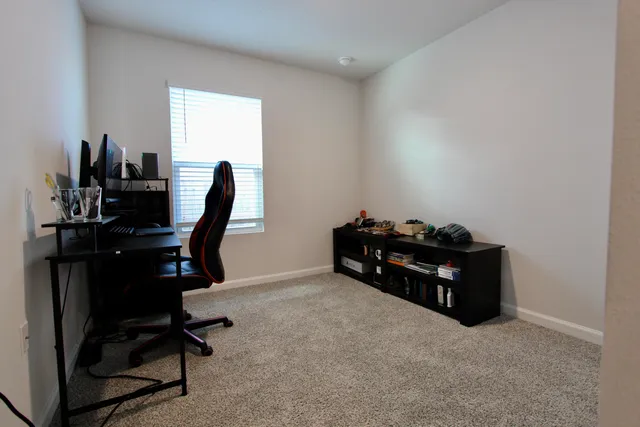 a room with furniture and a window