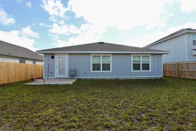 a house view with a garden space