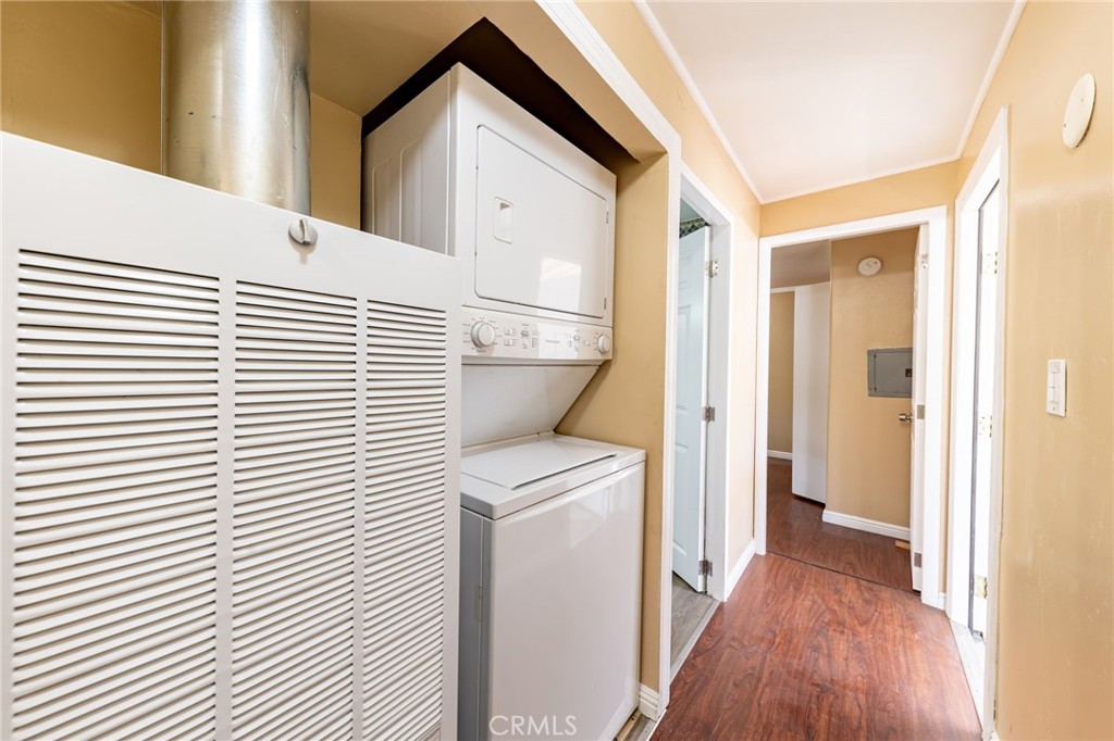 2250 West Mill Street, Unit 19 Colton, CA 92324 - Photo 11 of 27 a view of a hallway with a white wooden cabinets