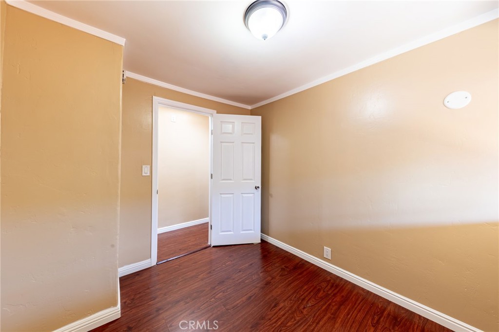 2250 West Mill Street, Unit 19 Colton, CA 92324 - Photo 17 of 27 a view of a room with wooden floor