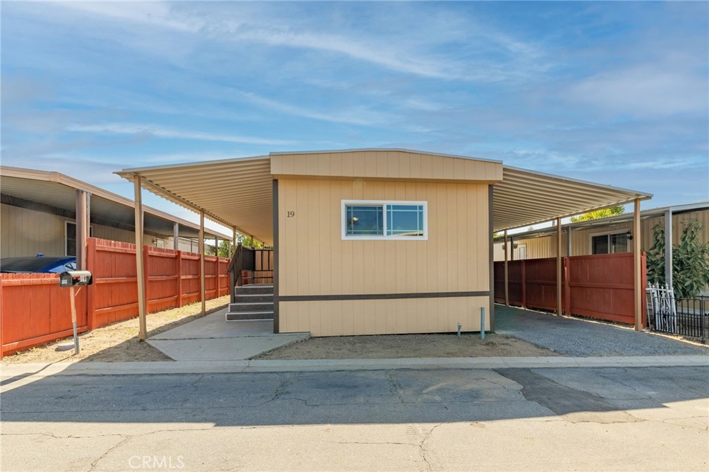 2250 West Mill Street, Unit 19 Colton, CA 92324 - Photo 21 of 27 a view of a house with an outdoor space