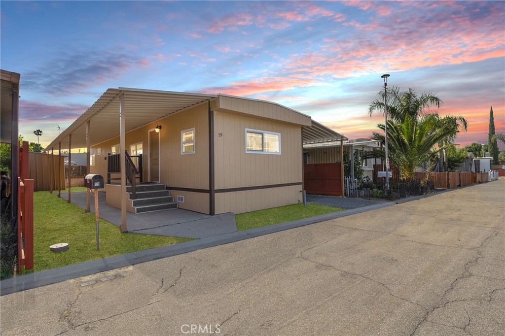 2250 West Mill Street, Unit 19 Colton, CA 92324 - Photo 27 of 27 a view of a house with a yard