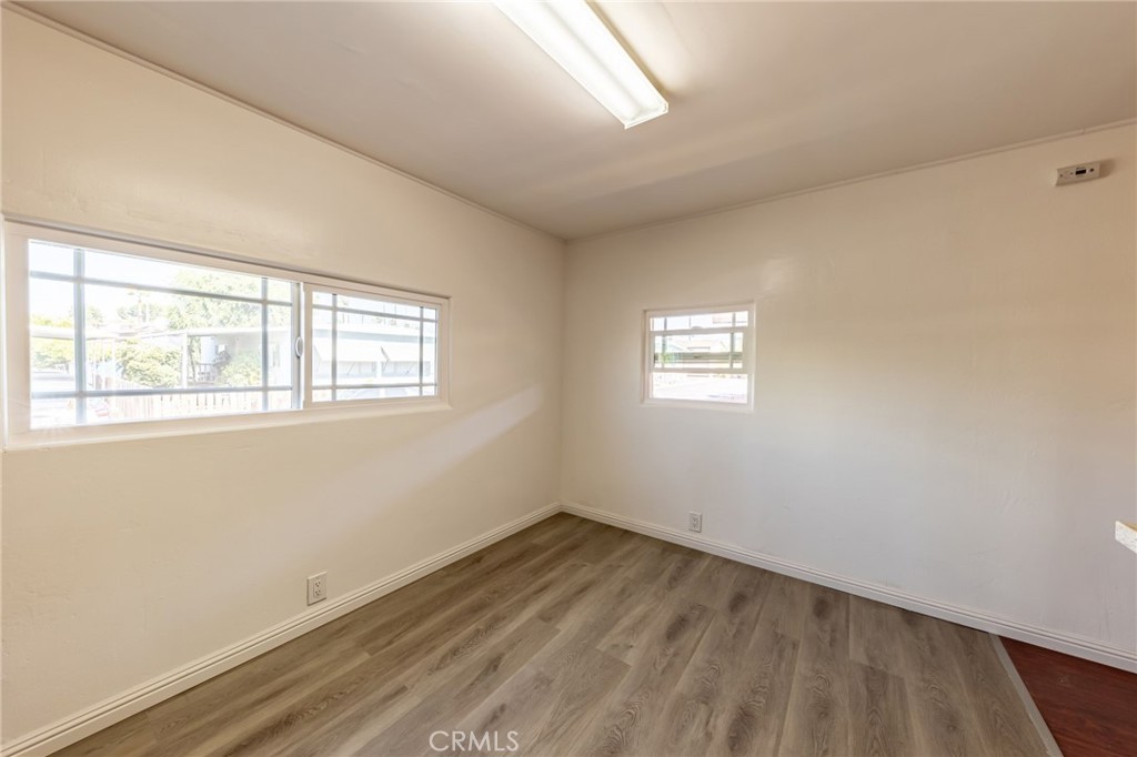 2250 West Mill Street, Unit 19 Colton, CA 92324 - Photo 10 of 27 a view of empty room with wooden floor and fan