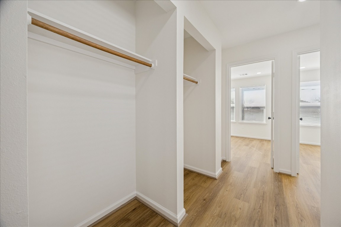 9913 Porto Rico Road Houston, TX 77041 - Photo 11 of 34 a view of a hallway with wooden floor