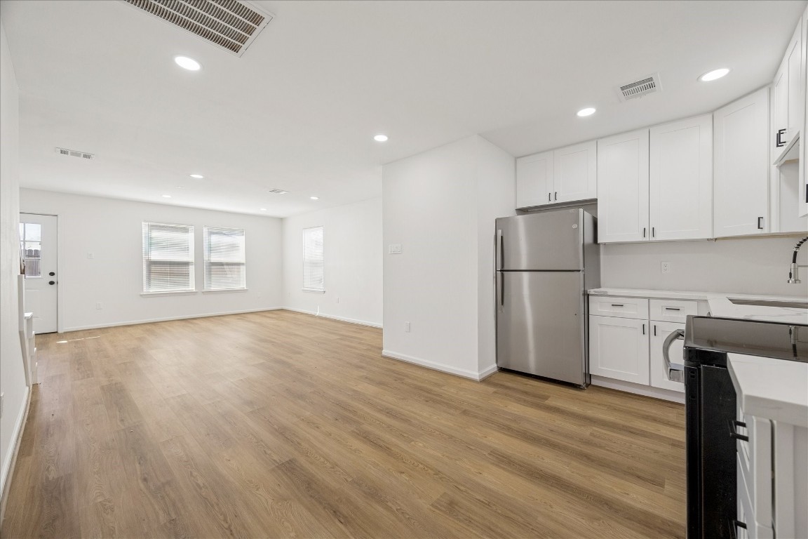 9913 Porto Rico Road Houston, TX 77041 - Photo 16 of 34 a view of an empty room with a kitchen