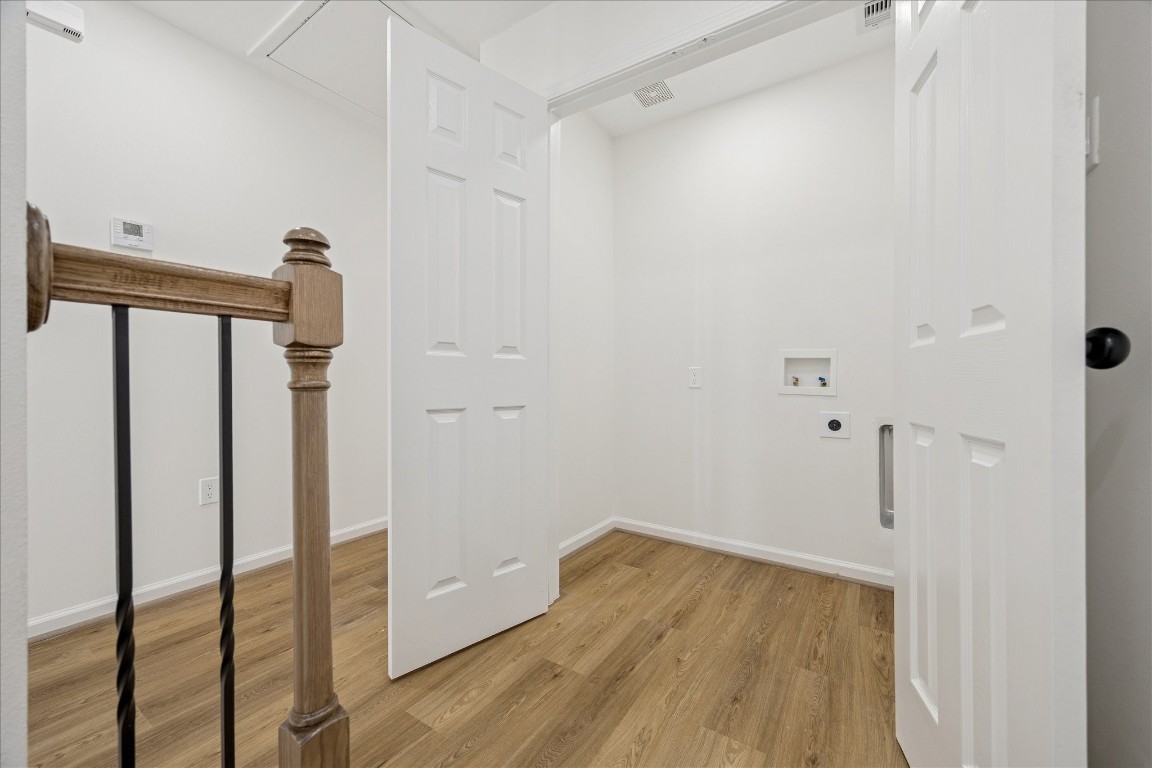 9913 Porto Rico Road Houston, TX 77041 - Photo 18 of 34 a view of empty room with wooden floor and fan