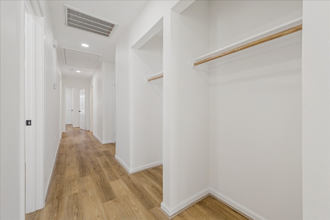 9913 Porto Rico Road Houston, TX 77041 - Photo 19 of 34 a view of a room with wooden floor and staircase