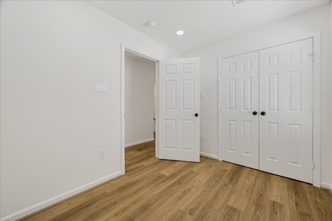 9913 Porto Rico Road Houston, TX 77041 - Photo 30 of 34 a view of an empty room with wooden floor