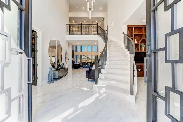 a view of living room kitchen and utility room