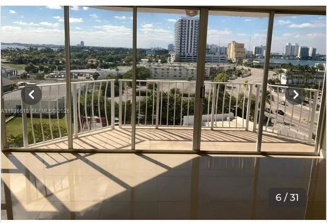 a view of a balcony with city view