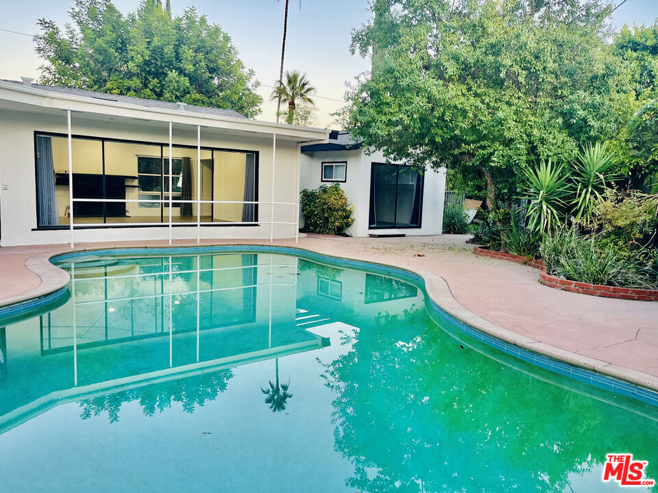 4675 Laurelgrove Avenue Studio City, CA 91604 - Photo 11 of 15 a front view of a house with a yard