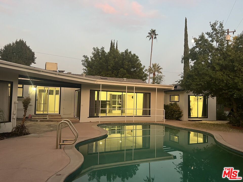 4675 Laurelgrove Avenue Studio City, CA 91604 - Photo 15 of 15 a view of a house with swimming pool and sitting area