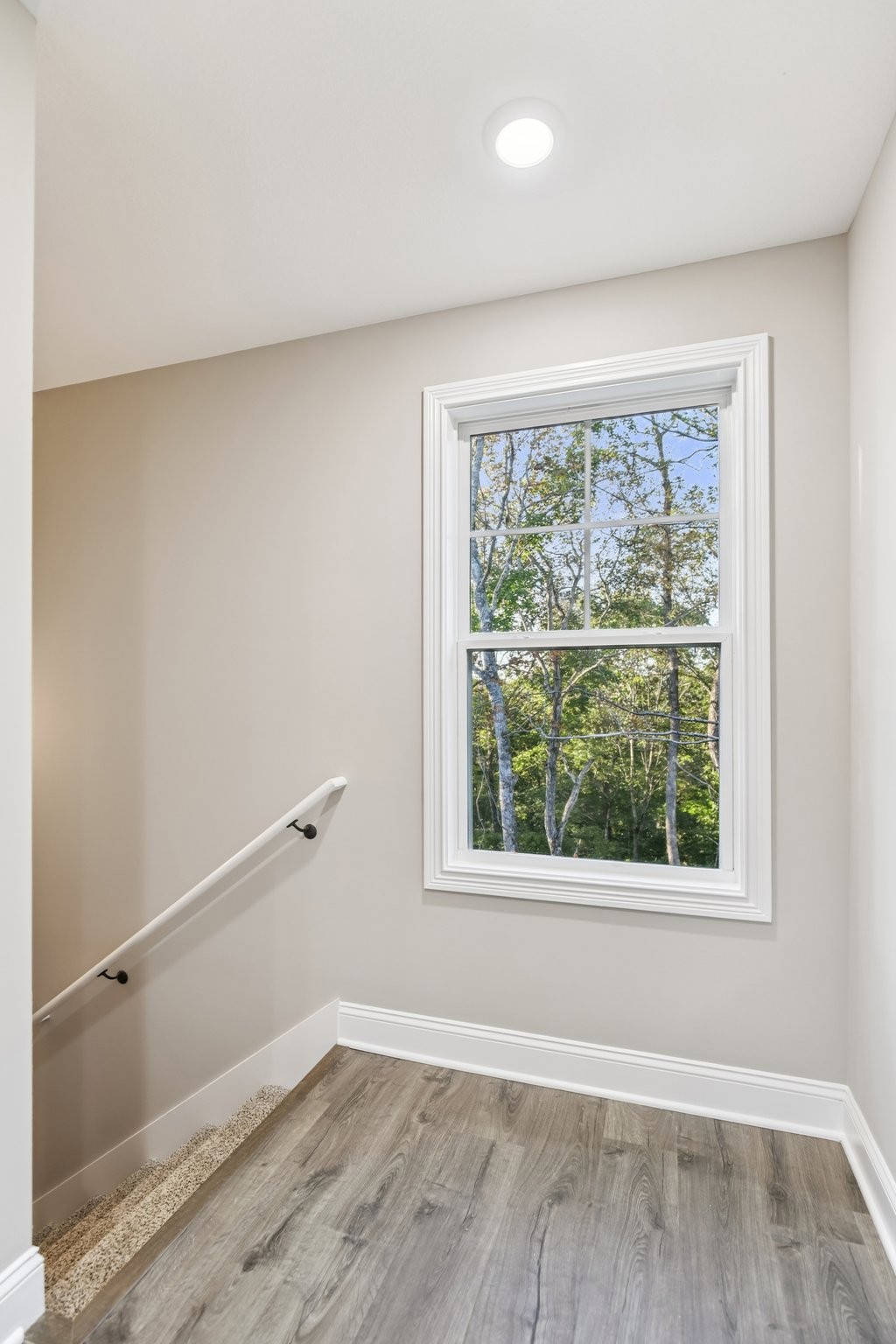 1288 Racker Drive Clarksville, TN 37043 - Photo 20 of 49 an empty room with wooden floor and windows