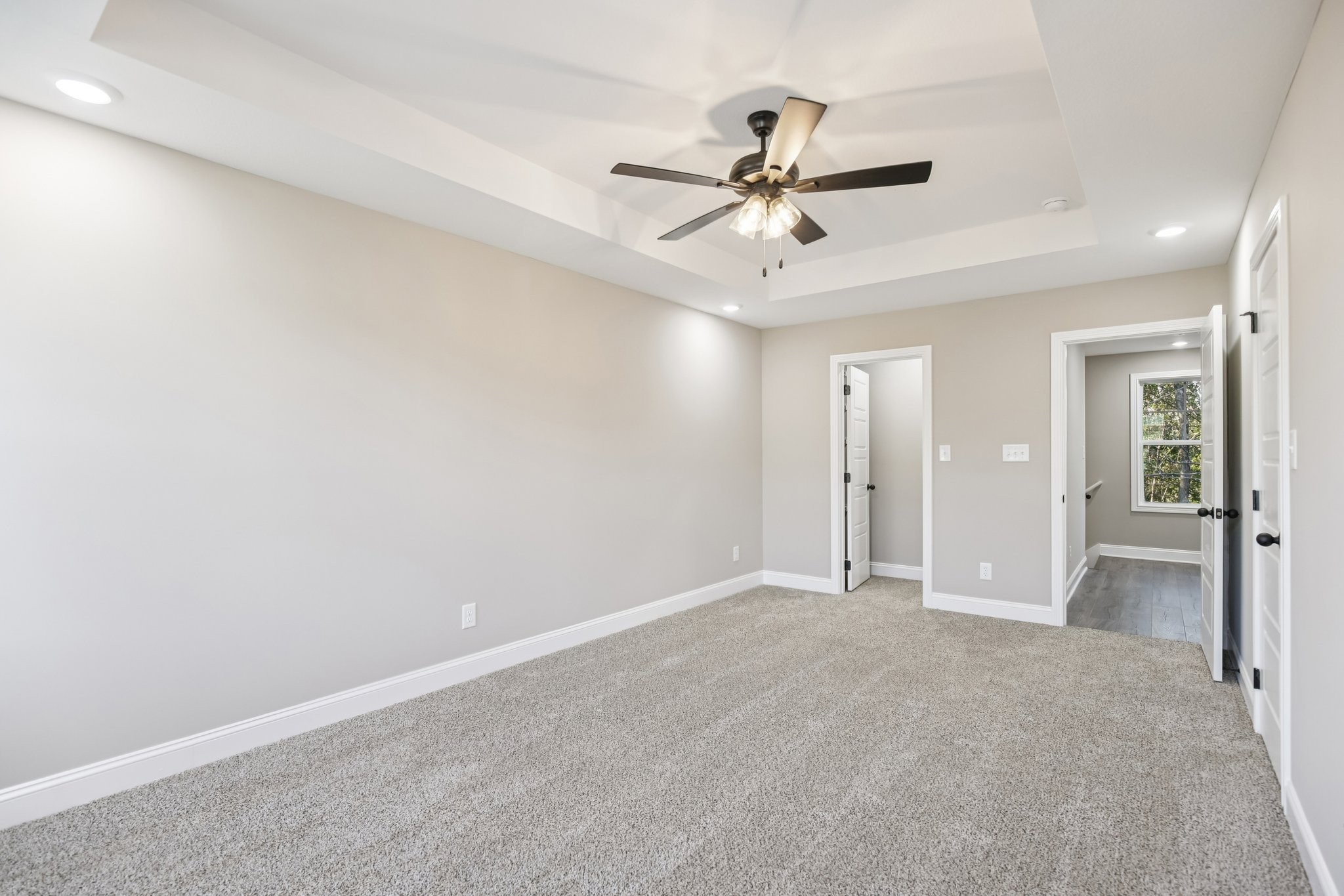 1288 Racker Drive Clarksville, TN 37043 - Photo 27 of 49 wooden floor in an empty room and a ceiling fan