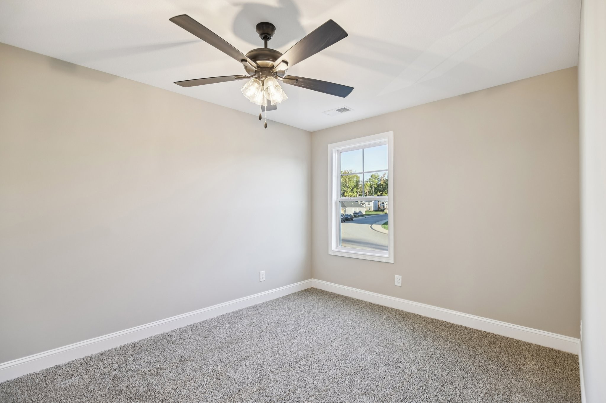 1288 Racker Drive Clarksville, TN 37043 - Photo 33 of 49 an empty room with a window and a fan