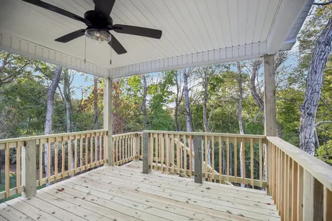 a view of balcony and wooden floor