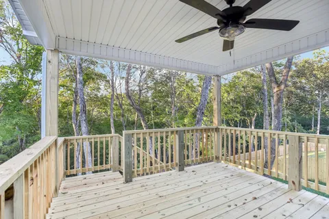 a view of balcony with wooden floor and outdoor space