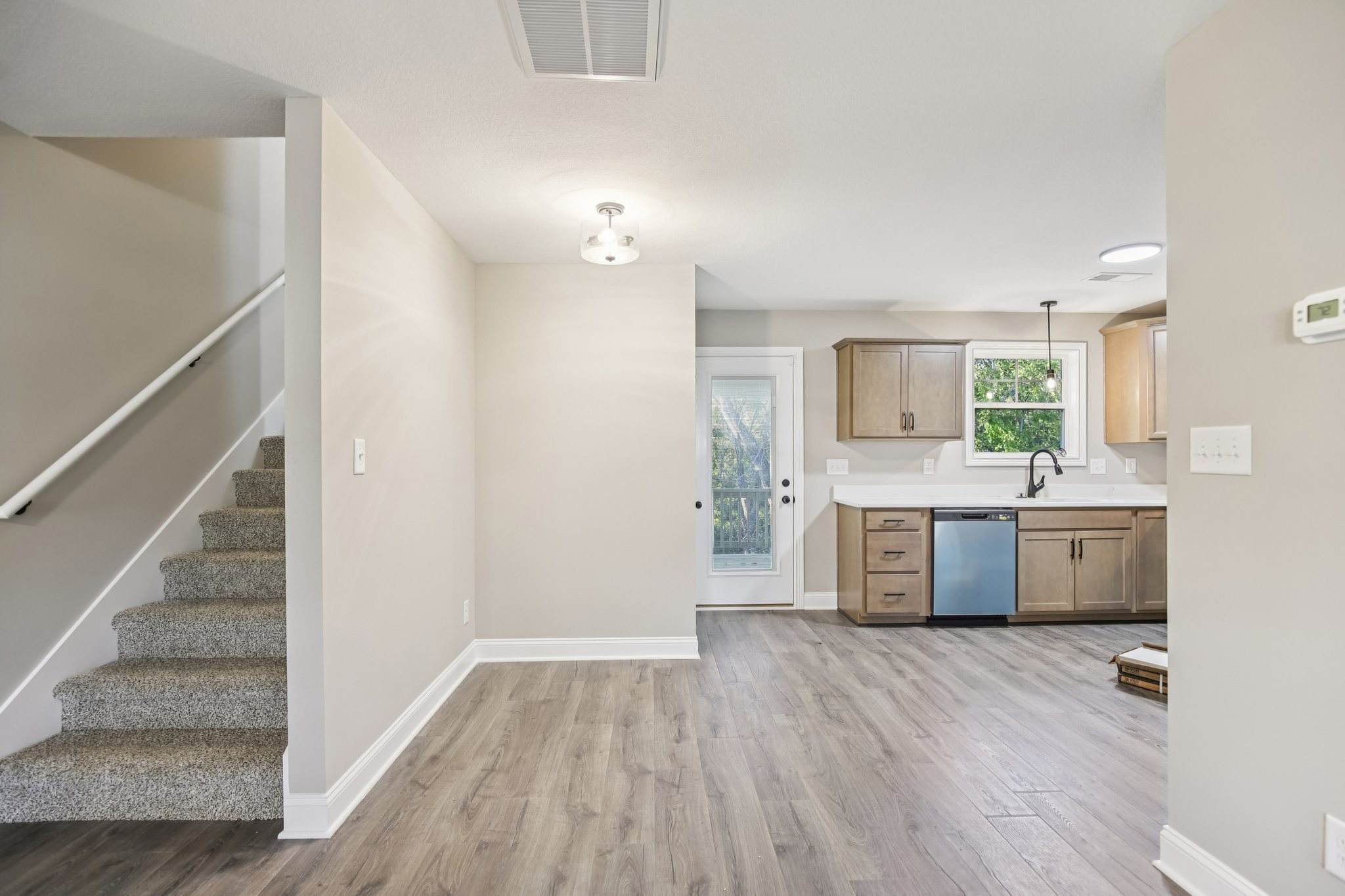 1288 Racker Drive Clarksville, TN 37043 - Photo 9 of 49 a view of a kitchen with a sink and a stove top oven