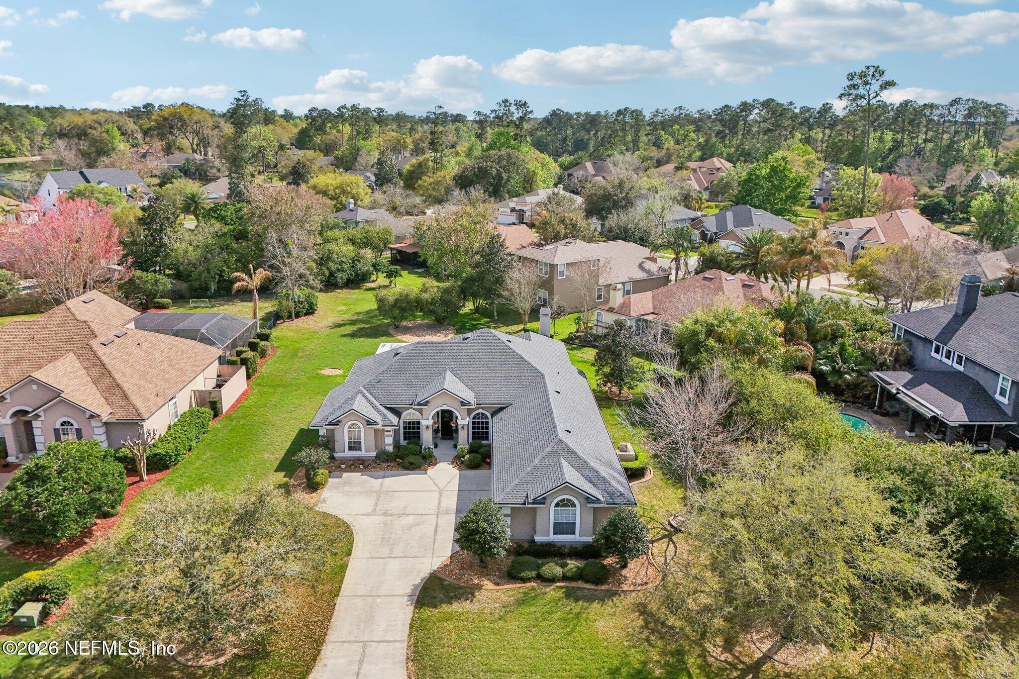 1933 Summit Ridge Road Fleming Island, FL 32003 - Photo 47 of 59 an aerial view of a house with a garden