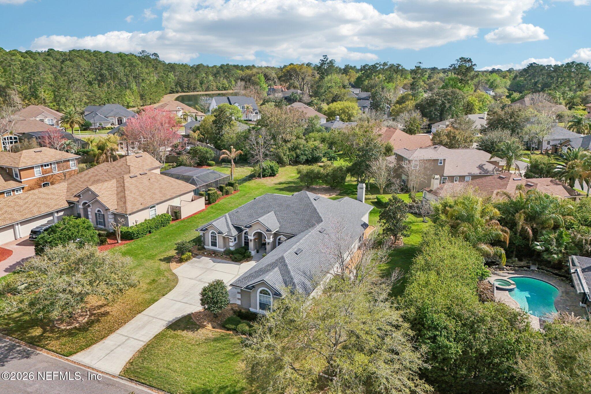 1933 Summit Ridge Road Fleming Island, FL 32003 - Photo 50 of 59 an aerial view of a house with a garden