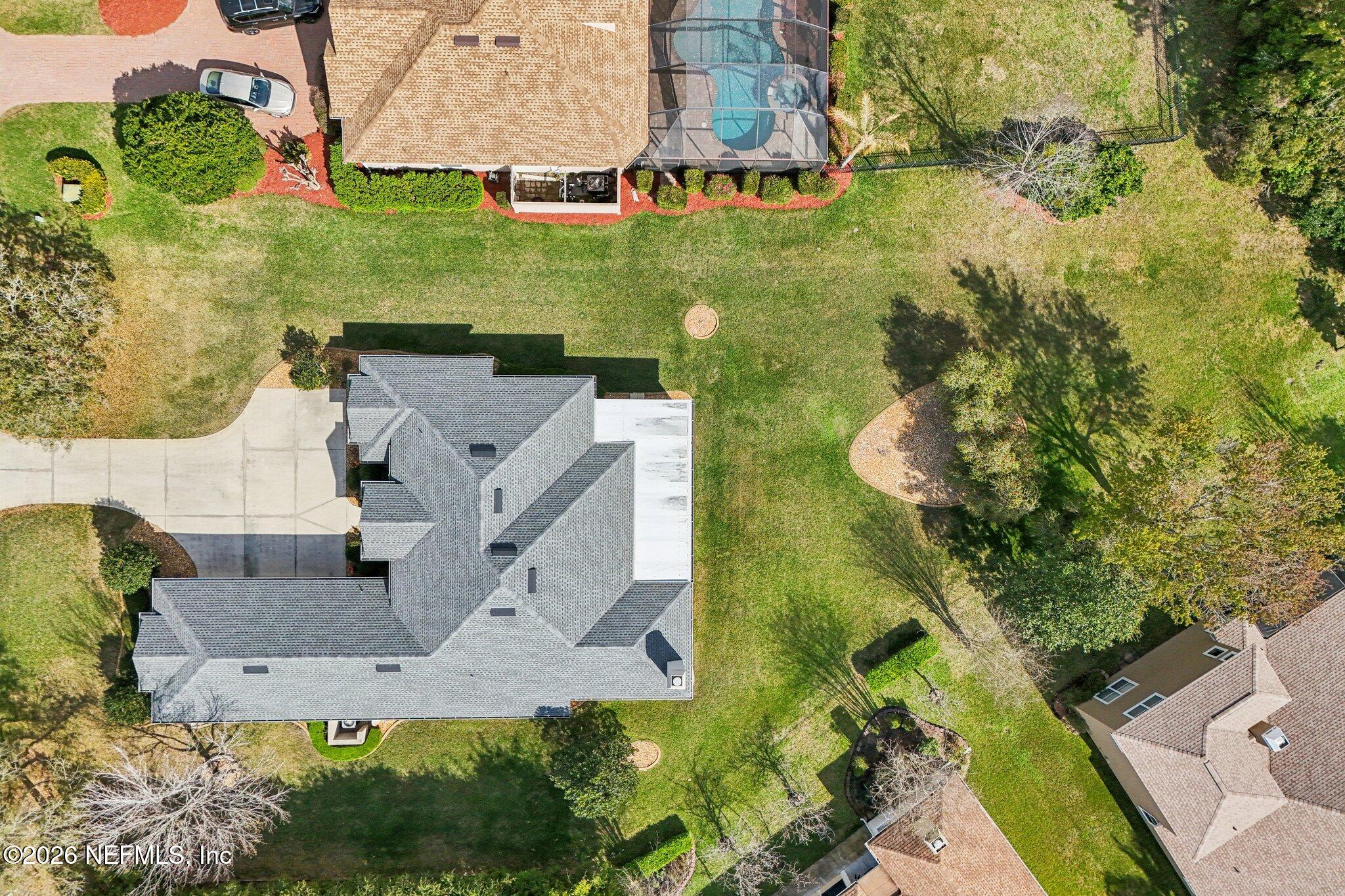 1933 Summit Ridge Road Fleming Island, FL 32003 - Photo 51 of 59 an aerial view of a house with a yard