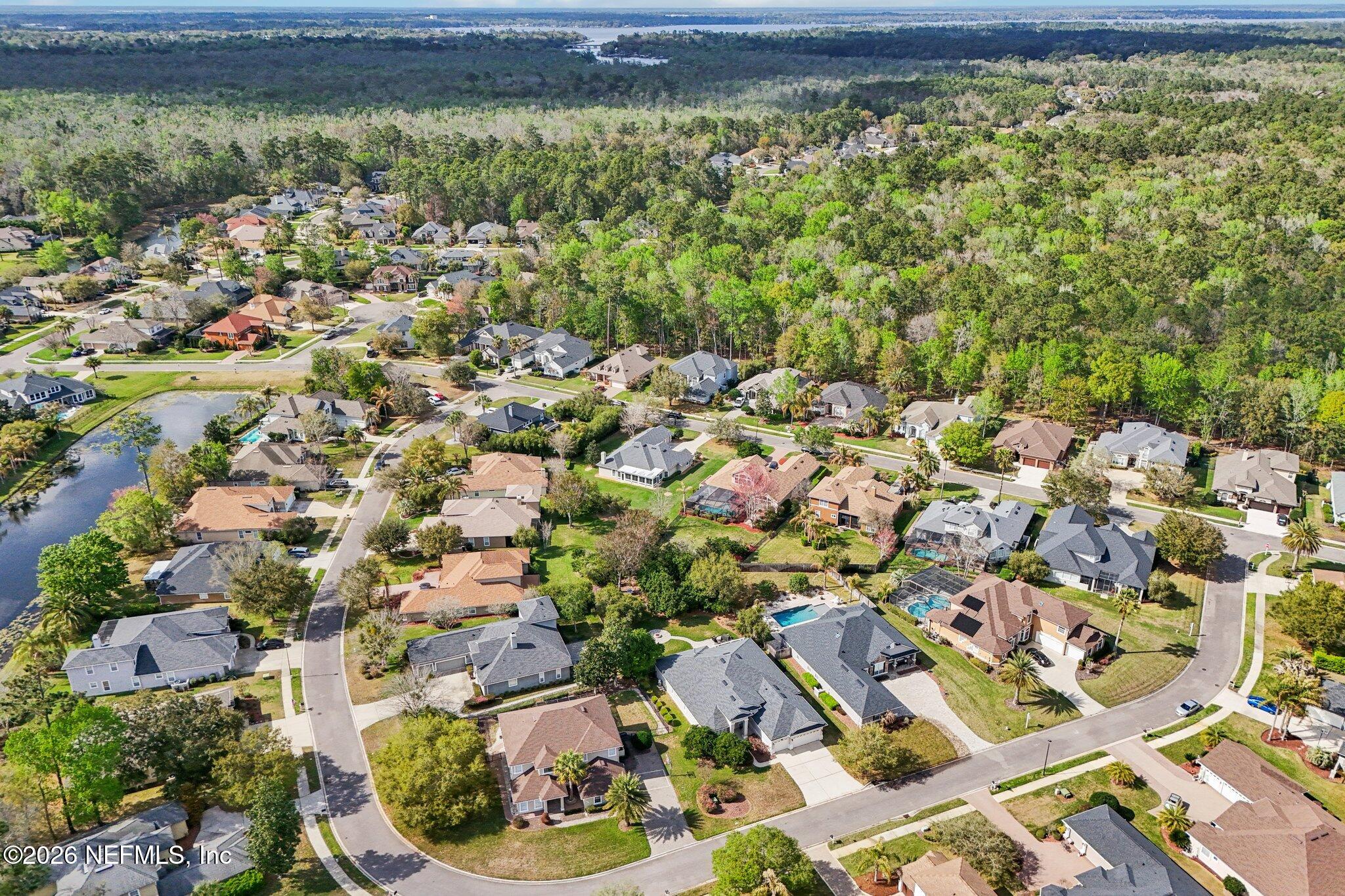 1933 Summit Ridge Road Fleming Island, FL 32003 - Photo 53 of 59 an aerial view of residential houses with outdoor space