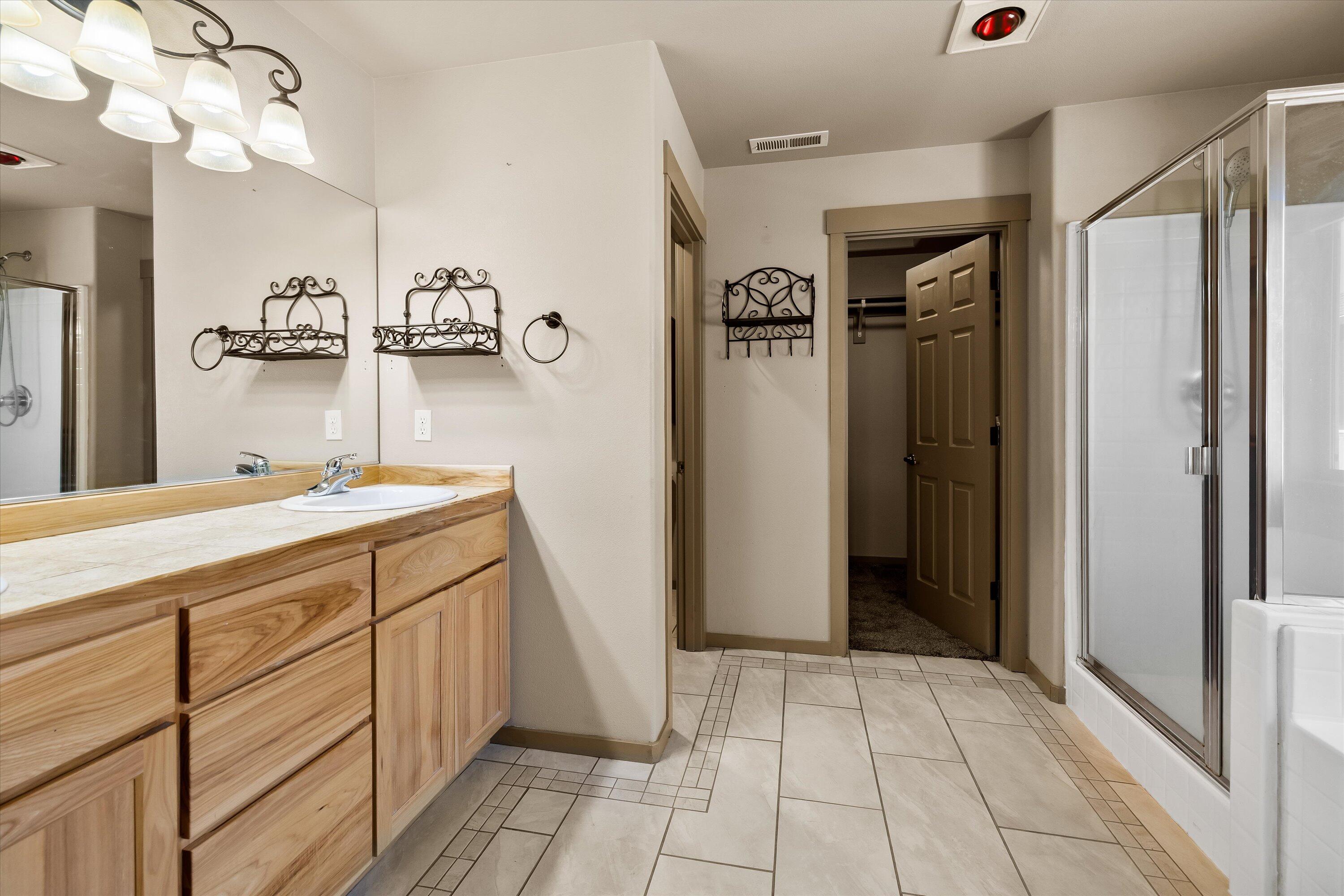 21190 Ritz Place Bend, OR 97702 - Photo 13 of 24 large primary bathroom with soaking tub and separate shower