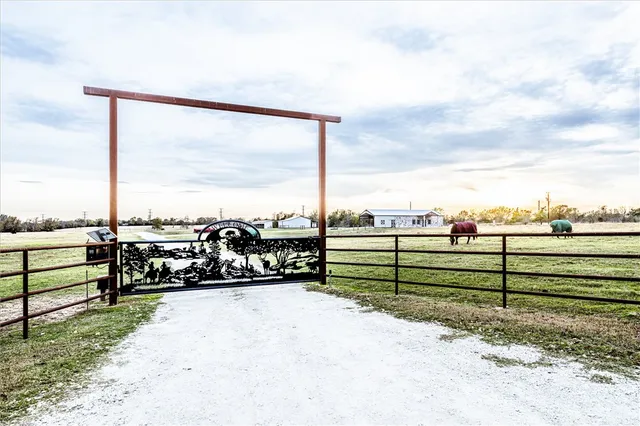 a view of a house with a big yard