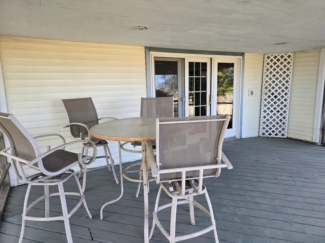 a bathroom with a sink vanity and a mirror