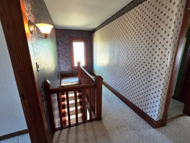 a view of empty room with windows