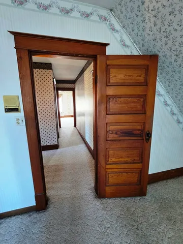 a room with cabinets and wooden floor