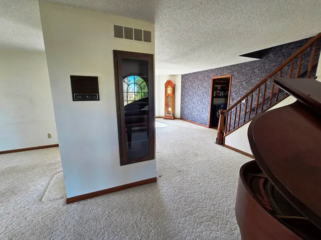 a view of livingroom and furniture