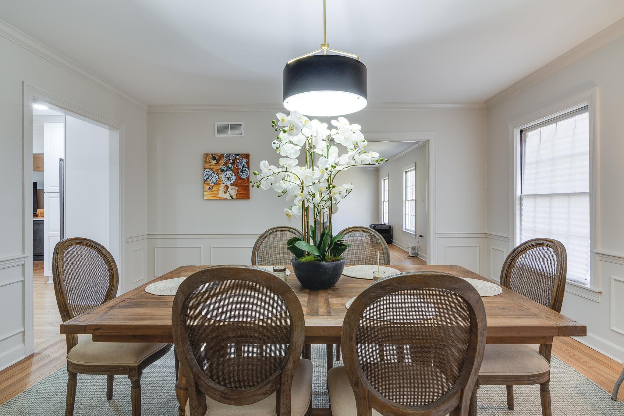 506 Peterson Lake Road Collierville, TN 38017 - Photo 23 of 28 a view of a dining room with furniture and chandelier