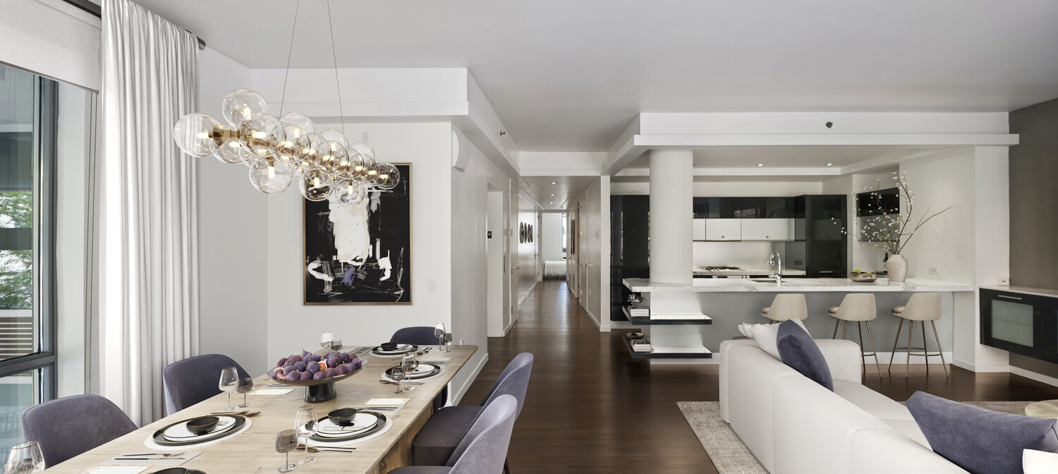 444 West 19th Street, Unit 201 Manhattan, NY 10011 - Photo 4 of 12 a living room with furniture and a chandelier