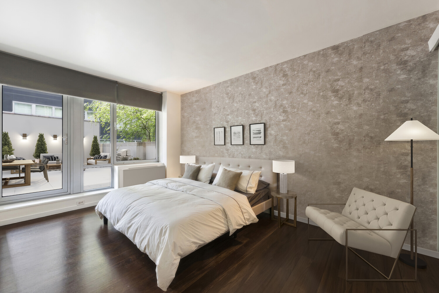 444 West 19th Street, Unit 201 Manhattan, NY 10011 - Photo 5 of 12 a bedroom with a bed and a chair