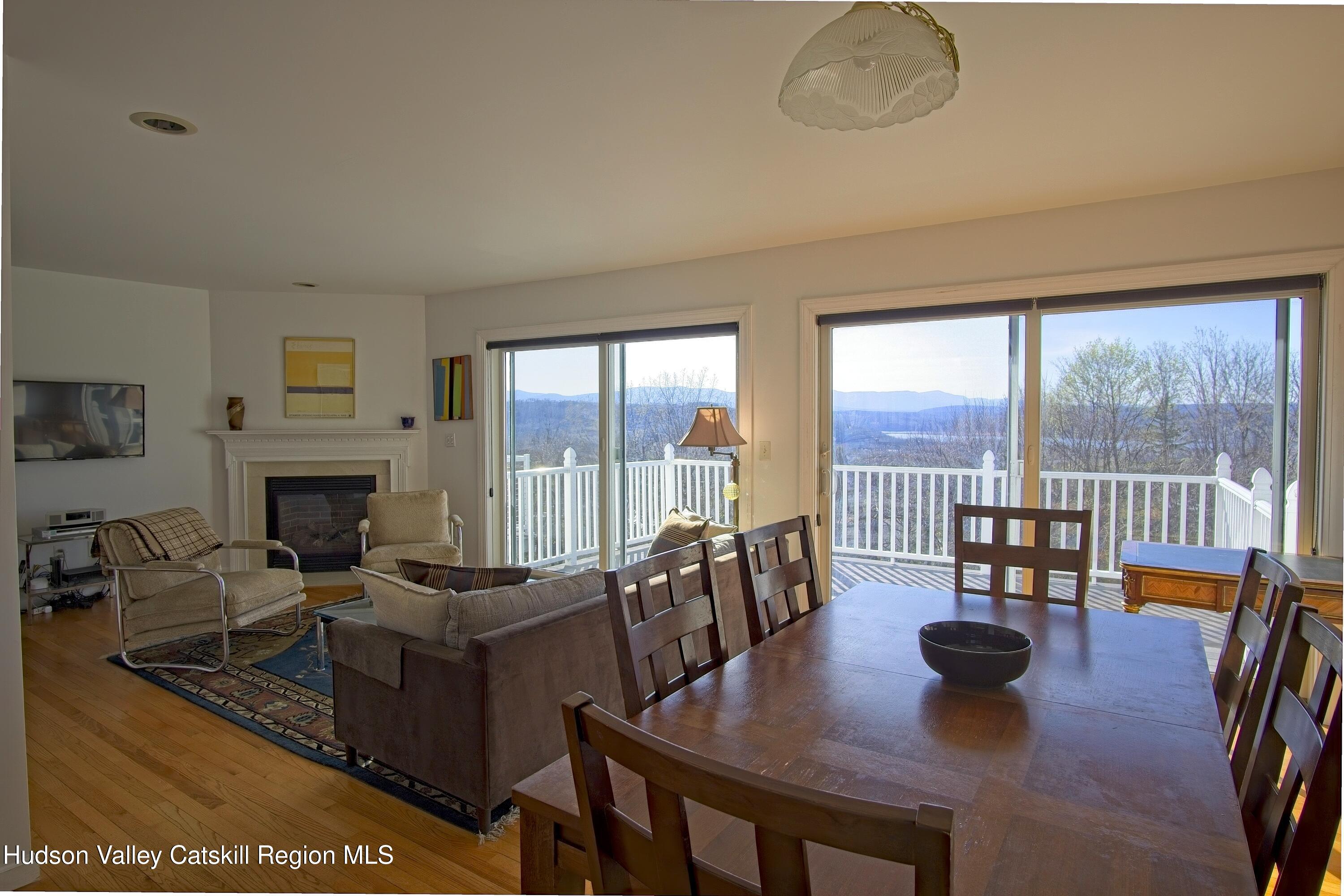 5 Van Winkle Road Hudson, NY 12534 - Photo 2 of 14 a living room with furniture and a fireplace